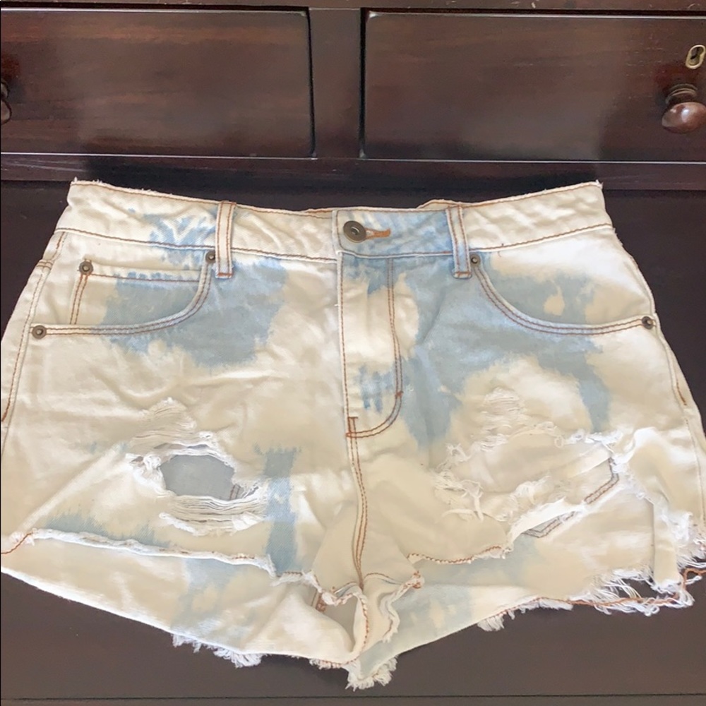 Acid wash extra-ripped jean shorts